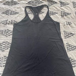 Lululemon size 12 black racerback tank top. Good used condition!